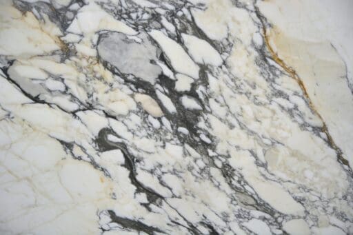Discover Calacatta Marble: A Design Icon 7 Calacatta Picasso Gold TH scaled 1